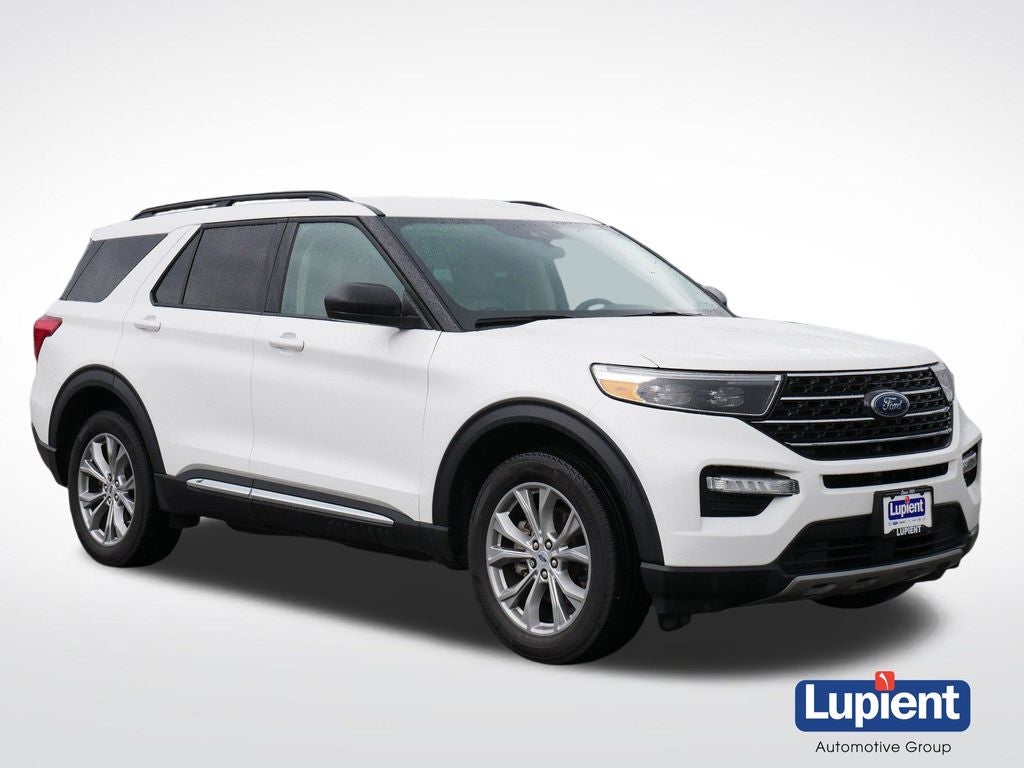2023 Ford Explorer XLT in White Metallic — front three-quarter view