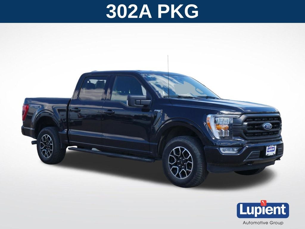 2023 Ford F-150 XLT in Black Metallic — front three-quarter view